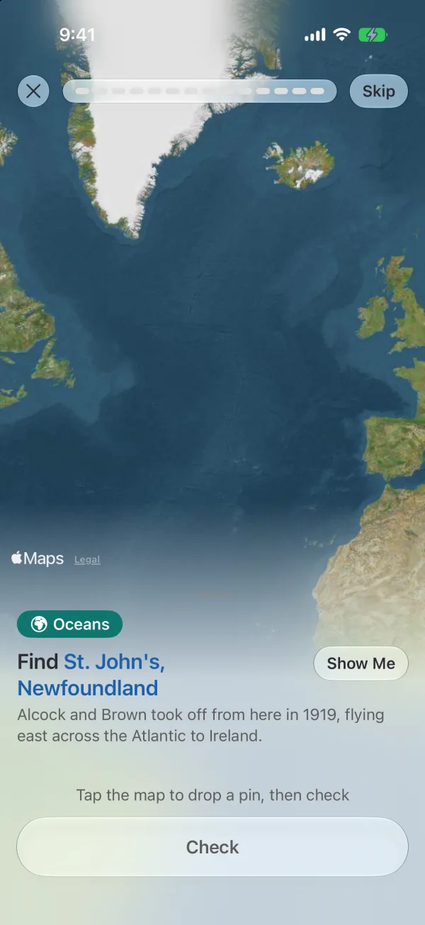 A map card: a satellite map of the North Atlantic and the question “Find St. John’s, Newfoundland.”