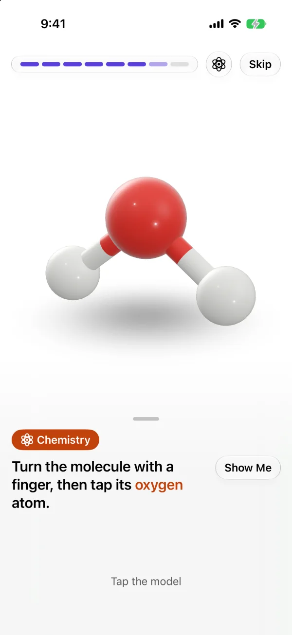 A lesson step with a glossy 3D water molecule: turn it with a finger, then tap the oxygen atom.